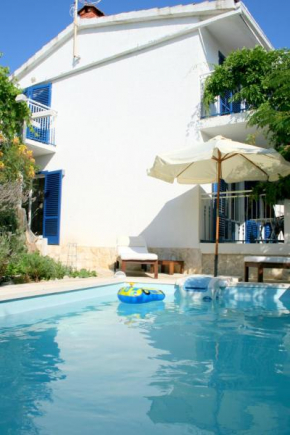 Family friendly apartments with a swimming pool Kaprije - 17692